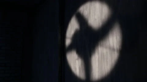 Shadow of a rotating fan on the wall Stock Footage 48601188