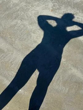 Shadow of Silhouette on the Beach Stock Photos