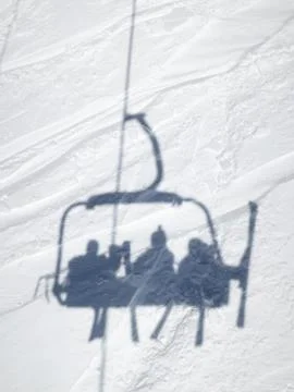 Shadow of ski lift chair Stock Photos