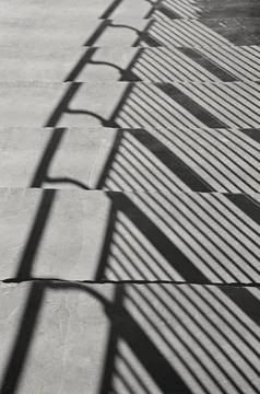 Shadow on the stairs Stock Photos