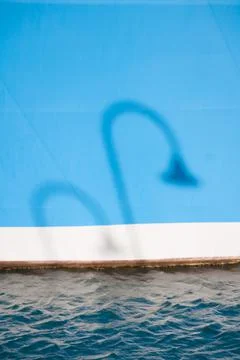 Shadow of a street lamp Stock Photos