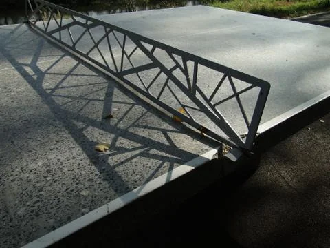 Shadow on the tennis table Stock Photos