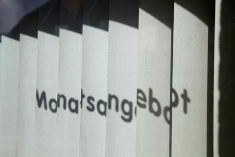 Shadow of text on shop window Stock Photos