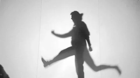 Shadow theater group performing on stage Stock Footage 54900746