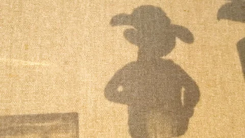 Shadow of a toy, in motion Stock Footage 286965093