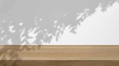 Shadow of the trees gently swaying in the breeze, on a white background wit.. Stock Photos