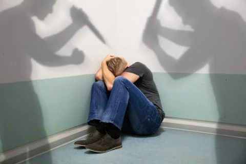 Shadow Of Two People Attacking Man Stock Photos