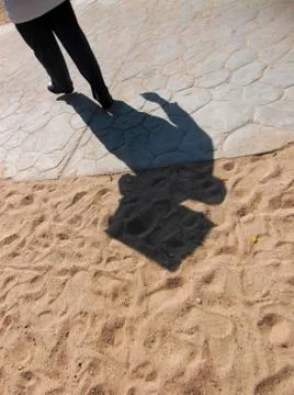 Shadow of the waiter with a tray. Stock Photos