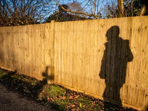 Shadow of walker Stock Photos