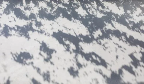 Shadow on the wall from the snow on the window Stock Photos