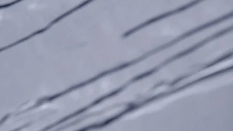 Shadow of water droplets running across a glass window Stock Footage 306003173
