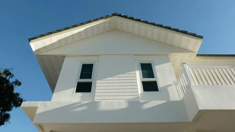 Shadow on white house Stock Footage 153611382