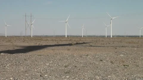 Shadow of wind turbine in deserts of Gansu, China Stock Footage 11129435