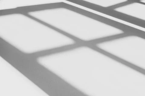 Shadow of window in morning light on wall Stock Photos