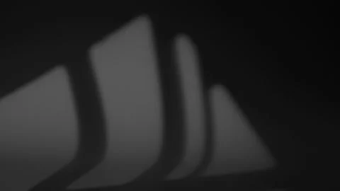 The shadow of a window moves along the surface of a gray wall at night in a room Stock Footage 165438199