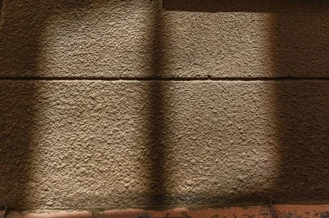 Shadow of window on wall at sunrise. Stock Photos