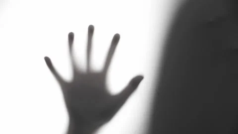 Shadow of a woman's hand and head Stock Footage 320748342