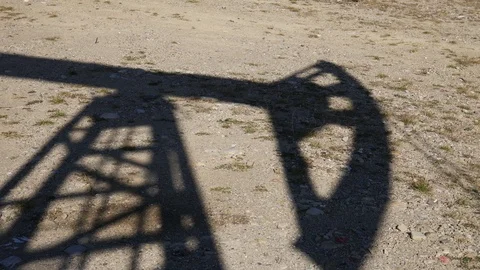 Shadow of working oil rig Stock Footage 97188101