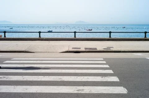 Shadow on zebra crossing Stock Photos