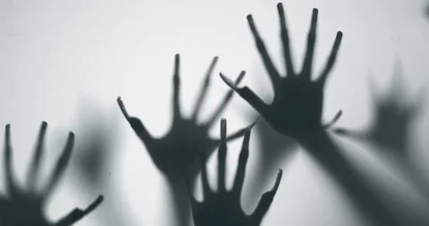 Shadow of a zombie hand on white background Stock Footage 276841701