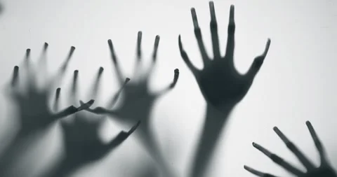 Shadow of a zombie hand on white background Stock Footage 277032799