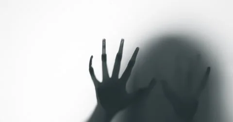 Shadow of a zombie hand on white background Stock Footage 324317308