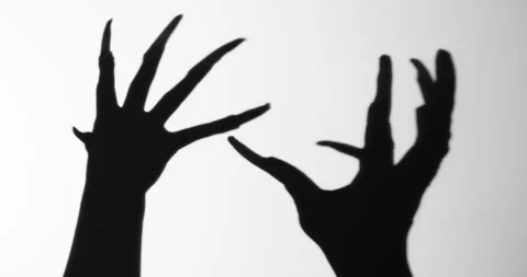 Shadow of a zombie hand on white background Stock Footage 333305016