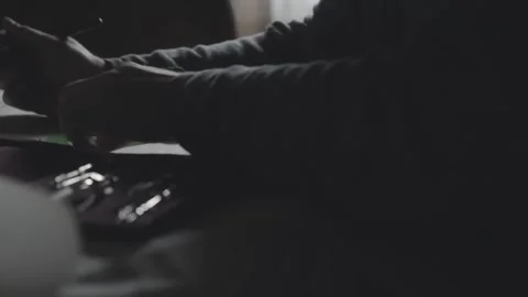 Shadowed Profile of Design Engineer Sketching Technical Blueprint in Low Light Stock Footage 341926437