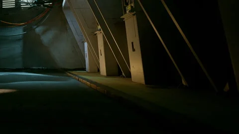 Shadows and light in an empty hallway with utility boxes Stock Footage 344145601