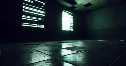 Shadows and light play in an abandoned industrial room with eerie atmosphere Ilustración de archivo