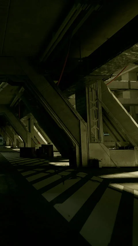 Shadows and light in an urban parking structure during the day Stock Footage 339959095