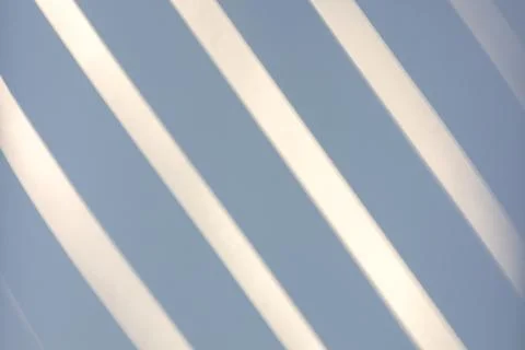 Shadows and lines on a blue background Stock Photos