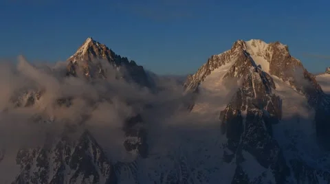 Shadows are Coming / Sundown Timelapse over Mountain Peaks in Alps Stock Footage 61819717