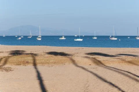 Shadows on the beach Stock Photos