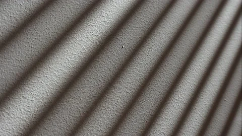 Shadows from the blinds on a white wall. Stock-Footage 210214996