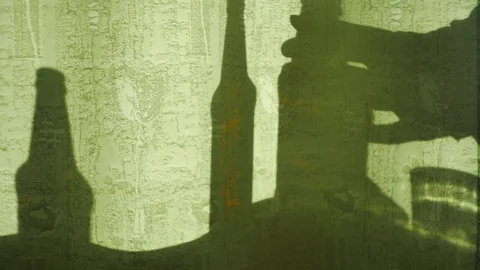 Shadows bottles, hand takes the bottle. Vídeos de archivo 114483041