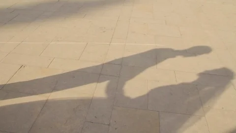 The shadows of bride and groom which are looking at each other Stock Footage 72464002