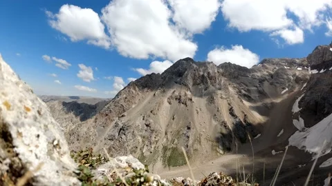 Shadows from the clouds float down the mountainside landscape with glacier point Stock Footage 140017036