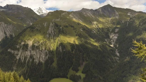 Shadows of clouds racing across Alpine landscape Stock Footage 139162706