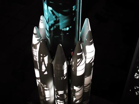 Shadows create a surrealistic image on the Boeing Delta II rocket and its b.. Stock Photos