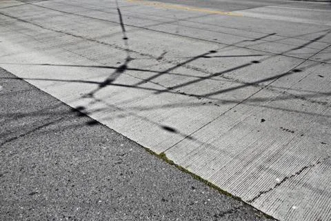 Shadows electricity on a road Stock Photos