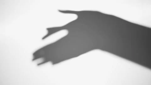 Shadows of elegant woman hands making gestures on white 動画素材 170814705