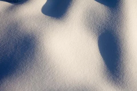 Shadows on fresh snow Foto stock