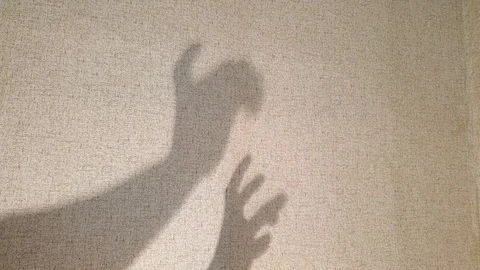 Shadows of hands on the wall. Stock Footage 106118231