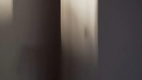 Shadows of hands on the wall. Games with light and shadow. Abstract shadows Video stock 132408147