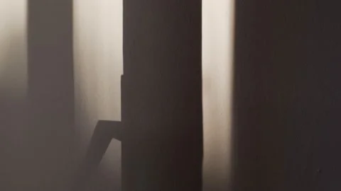 Shadows of hands on the wall. Games with light and shadow. Abstract shadows Video stock 132408542