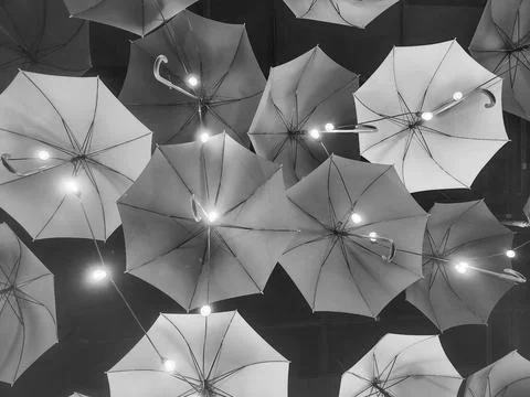 Shadows of Hanging Umbrellas Stock Photos