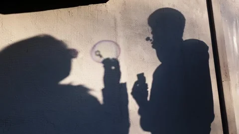 Shadows Making Soap Bubbles on Wall in Warm Sunlight Видео 330362053