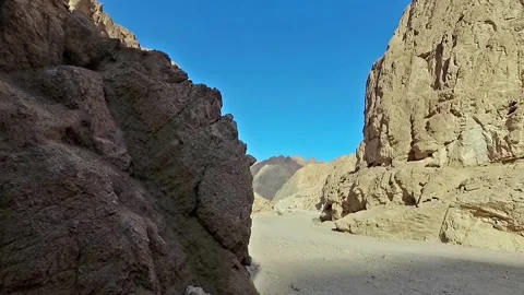 Shadows move along the rock Stock Footage 91056655
