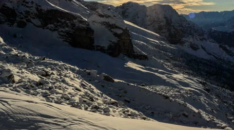 Shadows moving across snow slopes below Cima Brenta Video stock 45699989